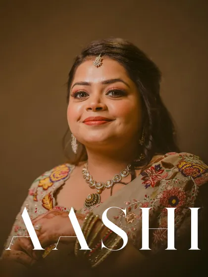 A classic, beautifully lit portrait of the bride, Aashi, for her engagement. Her happy expression and elegant look are perfectly captured.
