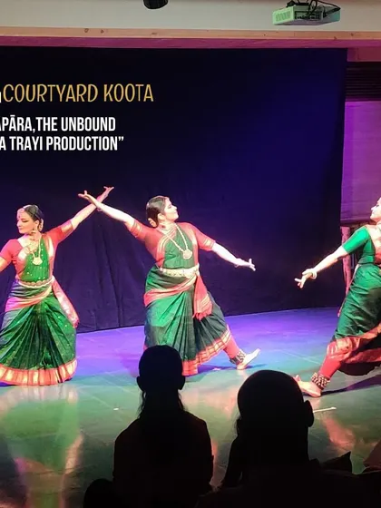 A performance shot from "Apāra, The Unbound," a Trayi production. The three dancers in perfect sync demonstrate the power and beauty of classical group choreography on our stage.