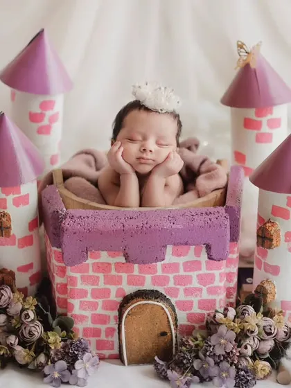 Every baby is a prince or princess ruling their own little kingdom. This fairytale castle setup is perfect for capturing that royal charm.
