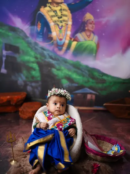A beautiful portrait of our little one in a traditional Koli outfit, complete with a floral headband.