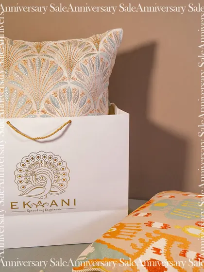 A glimpse of my soft furnishings, featured in an anniversary sale. The intricately patterned cushion covers are designed to add a touch of elegance and comfort to your living space.
