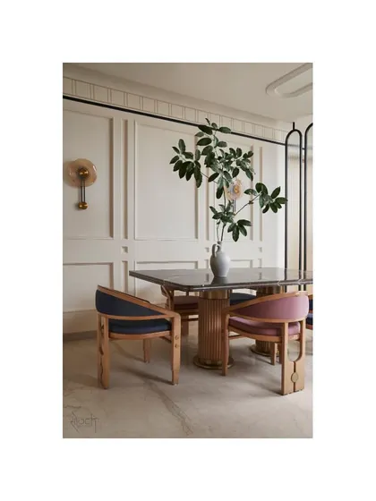The bespoke dining space, where every element is carefully curated for a subtle and impactful design.
