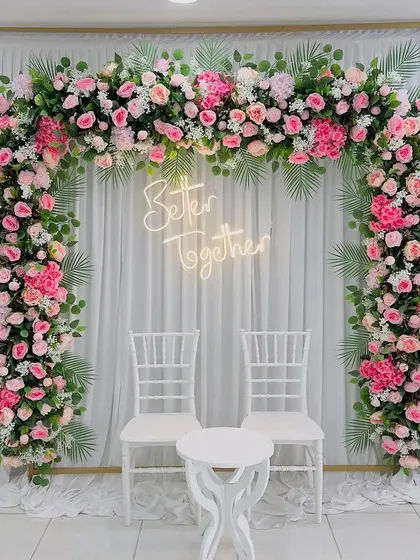 Our "Better Together" neon sign is a popular rental item for engagements, weddings, and anniversaries. It looks fantastic as a photo backdrop, especially when paired with a lush floral arch.