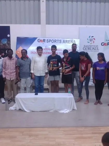 Our students from GMR Sports Arena receiving their awards at the annual Indoor Badminton Tournament.