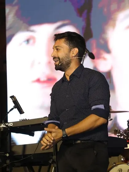 The stage setup for my club show, with a live band behind me. I can adapt my performance to fit any environment, from a simple stage to a full production.
