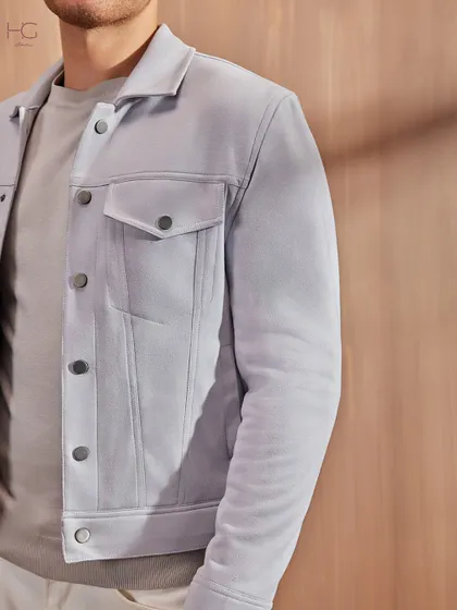 For laid-back layers, the shacket is the answer. This light grey version in a soft, suede-like fabric steps in when a blazer feels too much, offering relaxed yet luxe style.