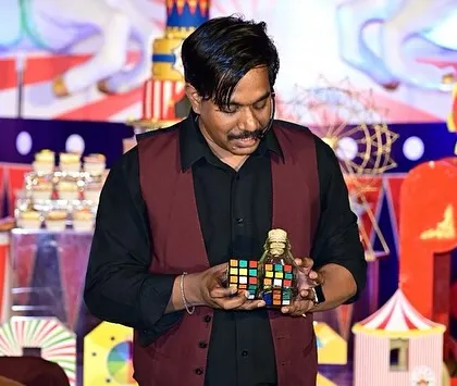 Performing my Rubik's cube magic at a private party. It's a modern and impressive trick that works well for audiences of all ages.