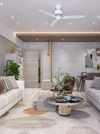 Another view of the conversation-focused living room, showing the open-plan connection to the dining area and the use of a textured ceiling panel to define the space.