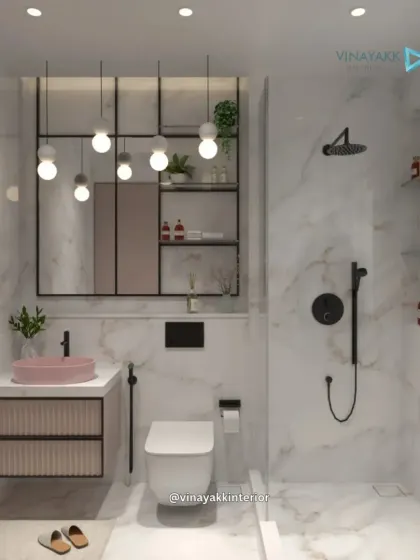 Even compact bathrooms can feel like a personal spa. We used floor-to-ceiling marble, contrasting matte black fixtures, and a pop of color in the basin to create a bathroom that is high on style and function.