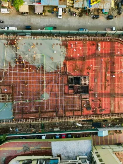 Our drone photography services offer a top-down perspective for large-scale projects. This aerial shot documents the slab work of a construction site in Mumbai, providing a clear and detailed progress report for real estate and development clients.