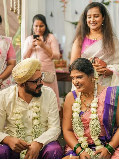 The smiles say it all. Surrounded by loved ones on my wedding day, wearing an outfit I designed to feel completely me. I specialize in creating custom bridal blouses and coordinated family outfits that capture the spirit of your celebration.