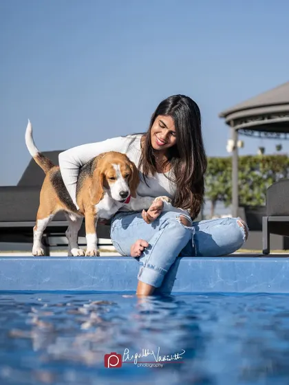 A duplicate of the poolside photo, highlighting the beautiful blue of the water and the happy, relaxed vibe.