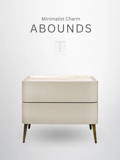 Minimalist charm abounds in this sleek bedside table. Its clean lines, rounded corners, and tapered metal legs create a look of understated elegance.