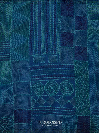 This image showcases the texture and geometry of traditional Kantha embroidery. The dense, running stitches in shades of blue create a beautiful, tactile surface that directly inspires the patterns in my Sundarban collection.