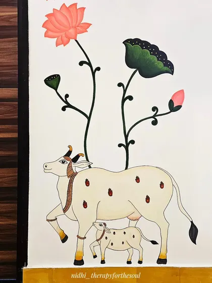 Another detail of the cow and calf against a dark wood panel, showing how the artwork can be adapted to different wall colors and textures for a striking contrast.
