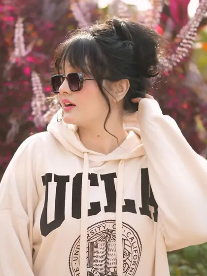 A candid-style side profile from the same shoot.