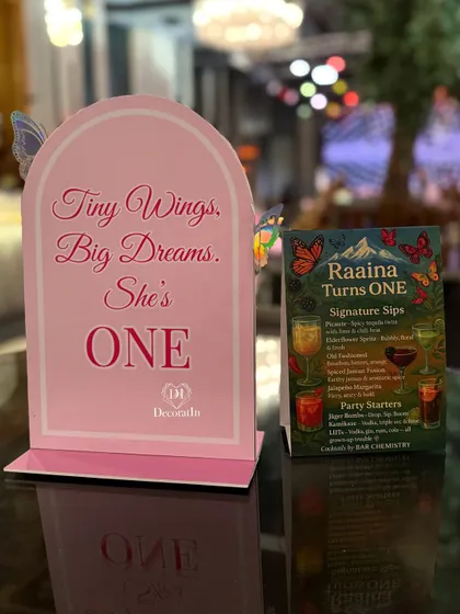 Another piece of custom stationery for the tables, with the message "Tiny Wings, Big Dreams. She's ONE."
