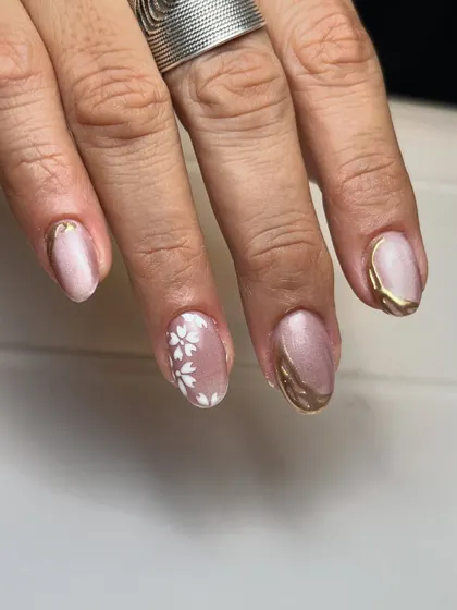 A different angle of the floral chrome design, showing the contrast between the delicate flower art and the edgy, metallic chrome.