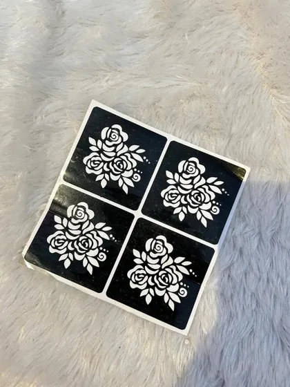 These small, individual rose bouquet stencils are perfect for creating a simple accent on the hand, wrist, or ankle. You can use one for a minimalist look or several to create your own pattern.