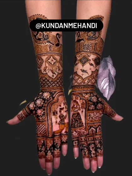 A proposal scene etched in henna. This design shows the groom proposing to the bride, a unique and personal moment to include in your bridal mehndi. The dark, rich stain makes the figures stand out.