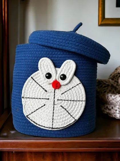 This deep blue Doraemon basket is perfect for adding a splash of color. It's a great size for storing art supplies, small toys, or even as a unique planter cover.