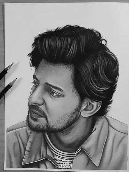 A graphite portrait of singer Darshan Raval. I worked on capturing a thoughtful expression and the detailed texture of his hair.