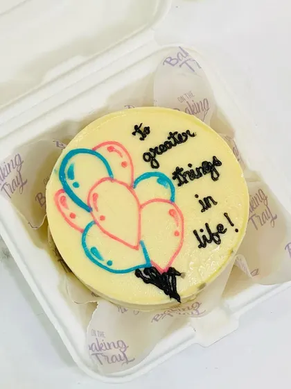 A close-up of my "To greater things in life!" bento cake, perfect for celebrating a new job, graduation, or any exciting new chapter.