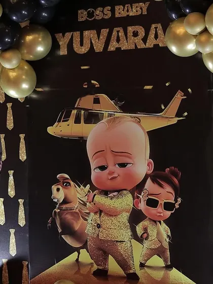 Another shot of the Boss Baby backdrop, showing the gold glitter details.