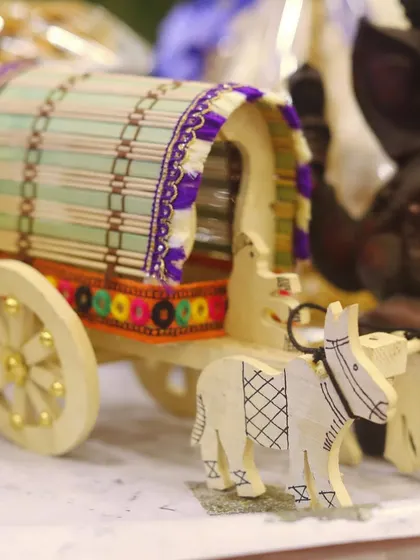 A charming and traditional prop of a bullock cart. These handcrafted items add an authentic, rustic touch to my decorations for events like housewarmings and baby showers.
