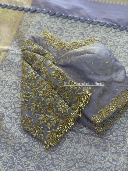 The full layout of the lavender floral blouse.