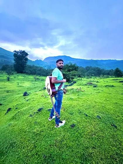 A simple shot with my guitar against a stunning backdrop of green hills. Nature and music are a perfect combination.