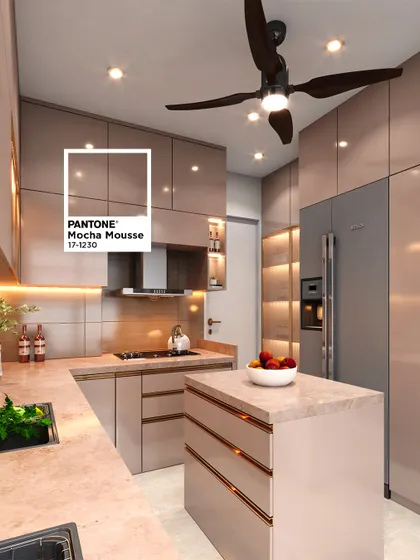 A beautiful example of a kitchen designed in the warm, trending "Mocha Mousse" color. The glossy cabinets, marble-look countertop, and island create a luxurious and inviting cooking space.