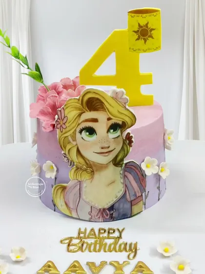 A lovely Rapunzel cake for a 4th birthday. This cake features a beautiful portrait of Rapunzel, decorated with flowers and the iconic sun lantern.