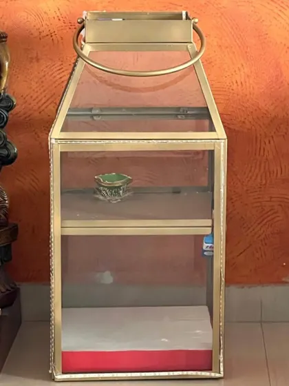 Before the transformation: an old brass and glass candle stand that the client wanted to repurpose. We saw the potential to turn this into a unique plant feature.