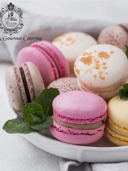 A beautiful assortment of colorful French Macarons. With crisp shells and chewy centers, these are a perfect, elegant addition to any dessert table.