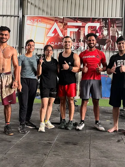 Sweat, smiles, and thumbs up all around. This is the feeling of accomplishment after a great group session.