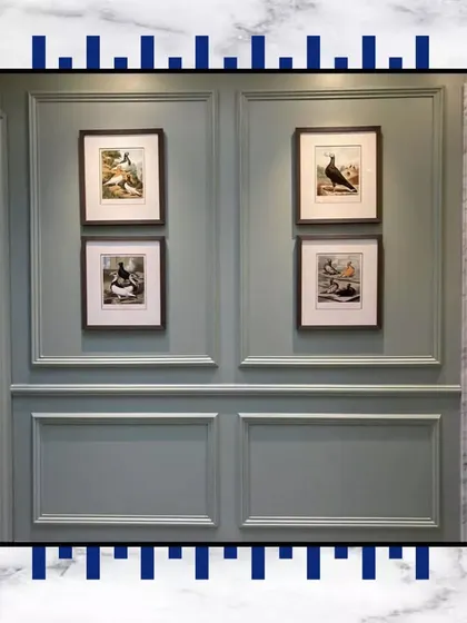 A sanctuary of sophistication. This wall, with its classic moulding and curated bird-themed artwork, shows how we create spaces that feel truly extraordinary and personal.