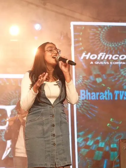 Singing my heart out at a recent show at RVITM. Performing for an energetic college crowd is one of our favorite things to do.