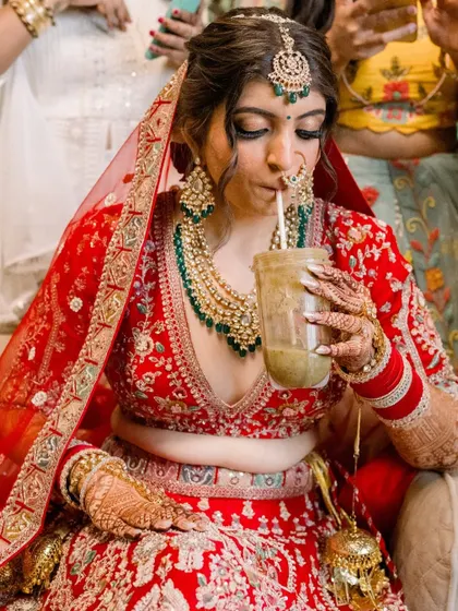 A bride needs her fuel! Divya taking a smoothie break, and her makeup is still perfect. This is the long lasting, comfortable wear I promise.