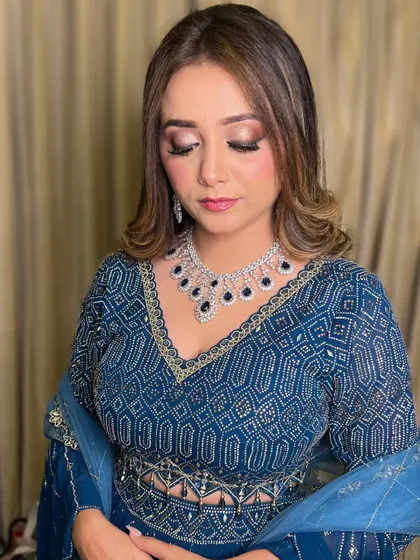 A close-up of the eye makeup, showing a blend of warm browns and a hint of shimmer. This is a versatile look that works beautifully for any evening event.