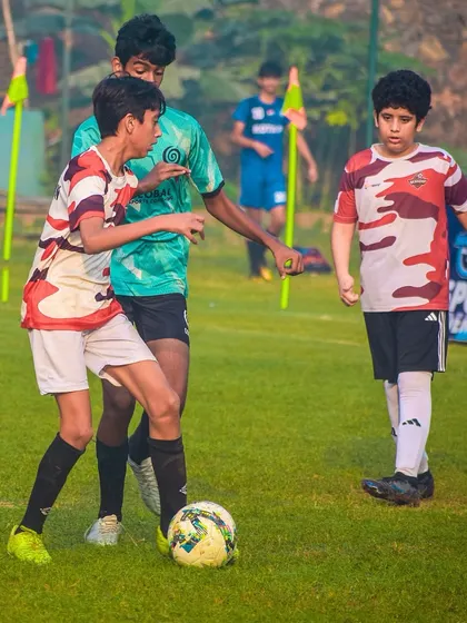 Intense midfield action with players fighting for every inch.