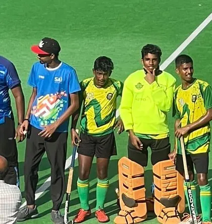 The team lining up with officials before the MSSA Tournament final.