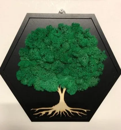 Bring nature indoors without the upkeep with our Evergreen Moss art. This piece uses real, preserved moss on a hexagonal wood panel to create a living wall effect that is completely maintenance-free, adding a touch of organic beauty to any room.