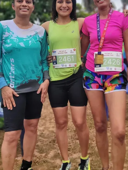 With my fellow runners after a wet and wonderful race. We all showed up despite the pouring rain and had a fantastic time.