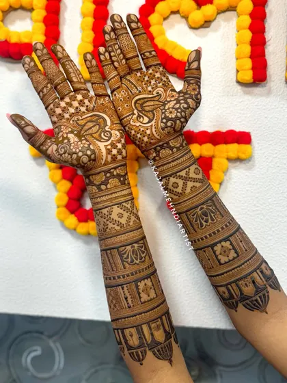 Another view of the bridesmaid's henna, showing how the design flows from the front to the back of the hand, creating a complete and cohesive look.
