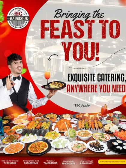 We bring the feast to you, no exceptions. This image illustrates the sheer abundance of our catering service, with a waiter presenting a full spread that covers the entire table, ready for your guests to enjoy.