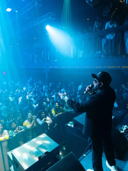 Mika Singh commands the attention of a packed club in Bangalore. I specialize in producing high-profile artist showcases in premium nightlife venues.