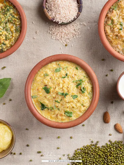 This image showcases a variety of healthy khichdis. The top-down view is an effective way to display multiple dishes at once, ideal for a health-food brand's catalogue.
