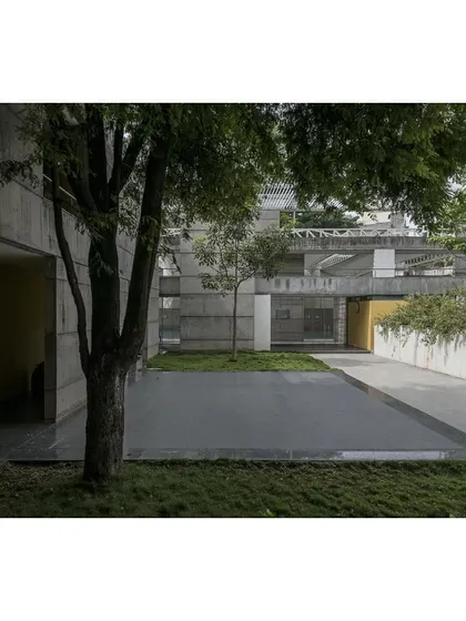 A water body integrated into the landscape of the IIM Sports Center. This element helps to create a tranquil atmosphere and reflects the surrounding nature and architecture.