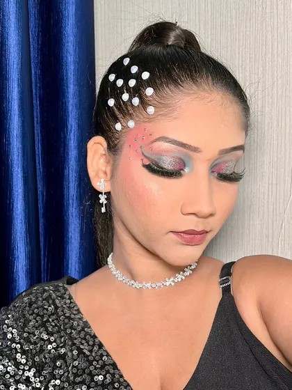 A detailed view of the smokey eye makeup. The blending is seamless, creating a sultry and sophisticated look.